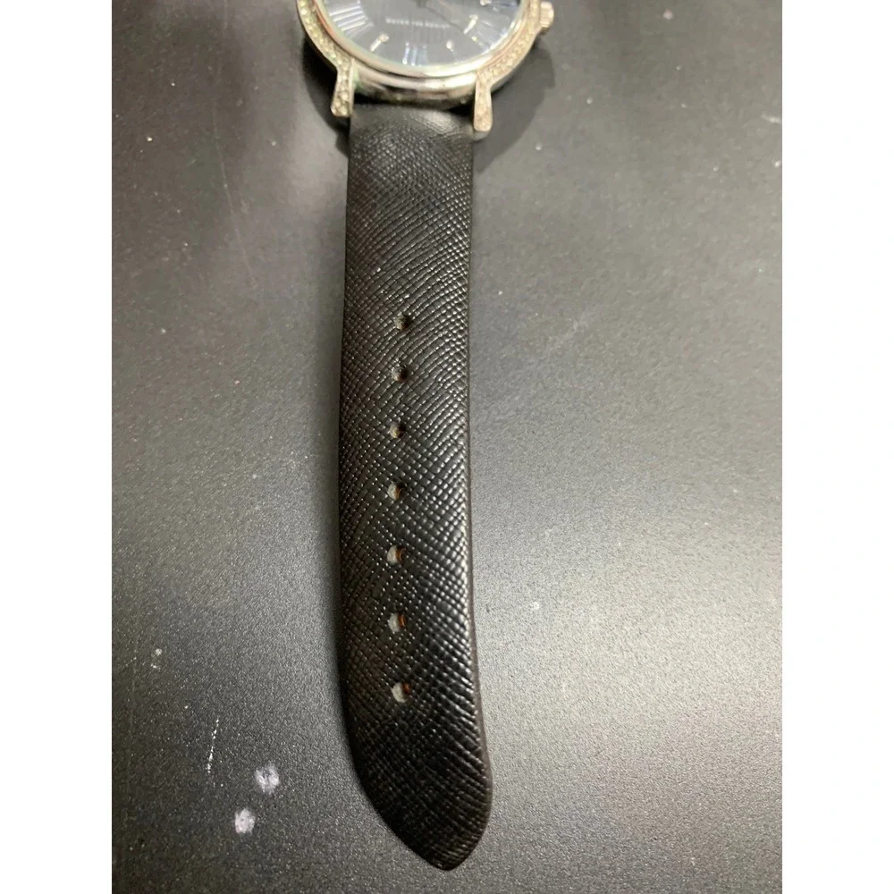 Anne Klein AK/1155 Crystal Bezel Black Dial Leather Strap Watch Womens